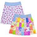 Two girls' skirts shown on a plain white background. The back skirt has a white background with a pink floral print and a light blue waistband.