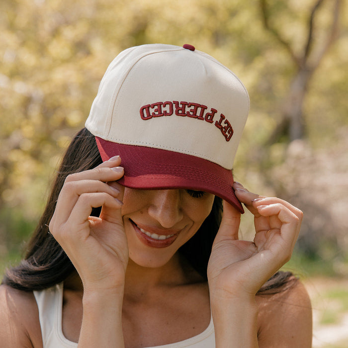 Get Pierced Trucker Hat in Berry