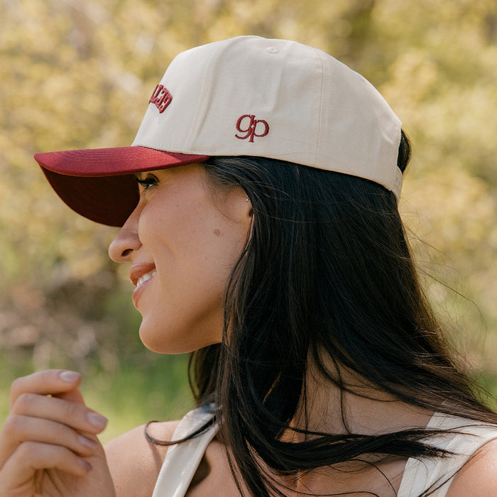 Get Pierced Trucker Hat in Berry