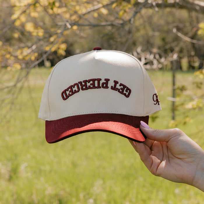 Get Pierced Trucker Hat in Berry
