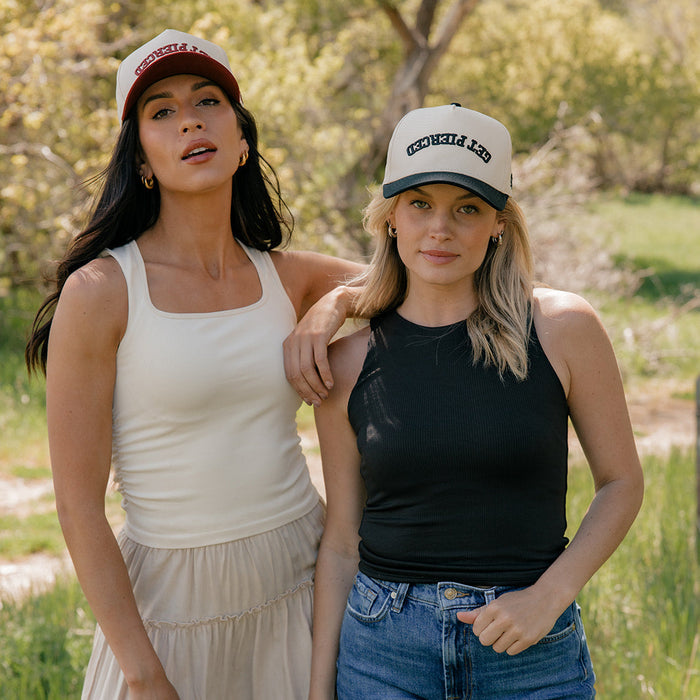 Get Pierced Trucker Hat in Berry