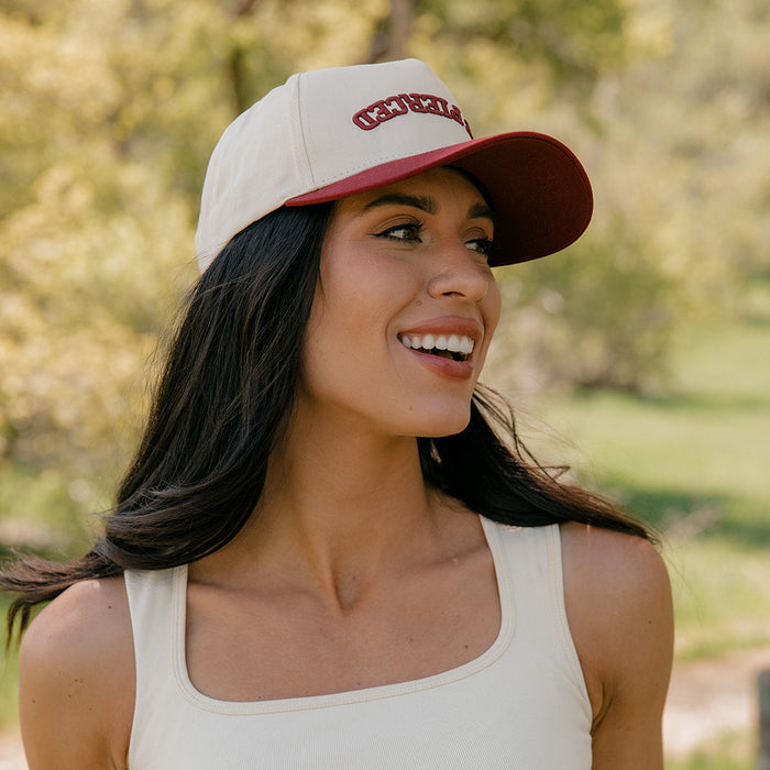 Get Pierced Trucker Hat in Berry
