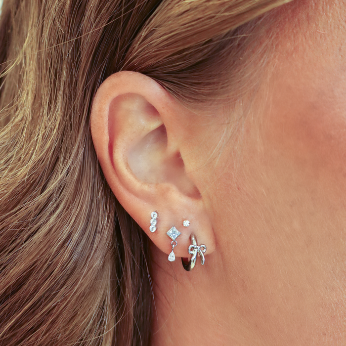 Girly Bow Hoops in Titanium