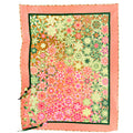 A square scarf with a dense floral and geometric pattern, featuring a coral pink border and a multicolor center with pink, green, and orange motifs.