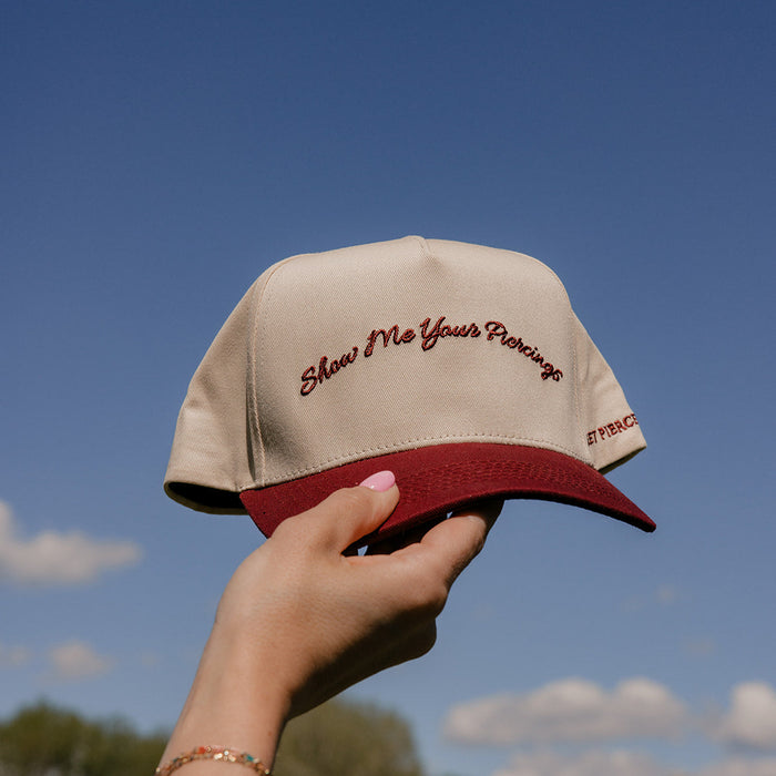 Show Me Your Piercings Trucker Hat in Berry