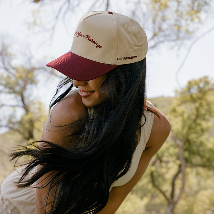 Show Me Your Piercings Trucker Hat in Berry
