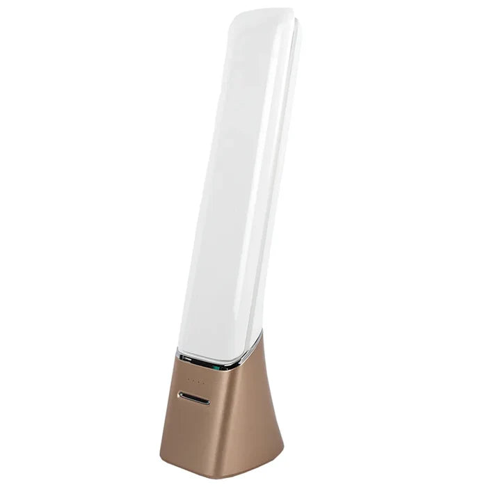 Tall, thin electronic device with a white top and gold base on a white background